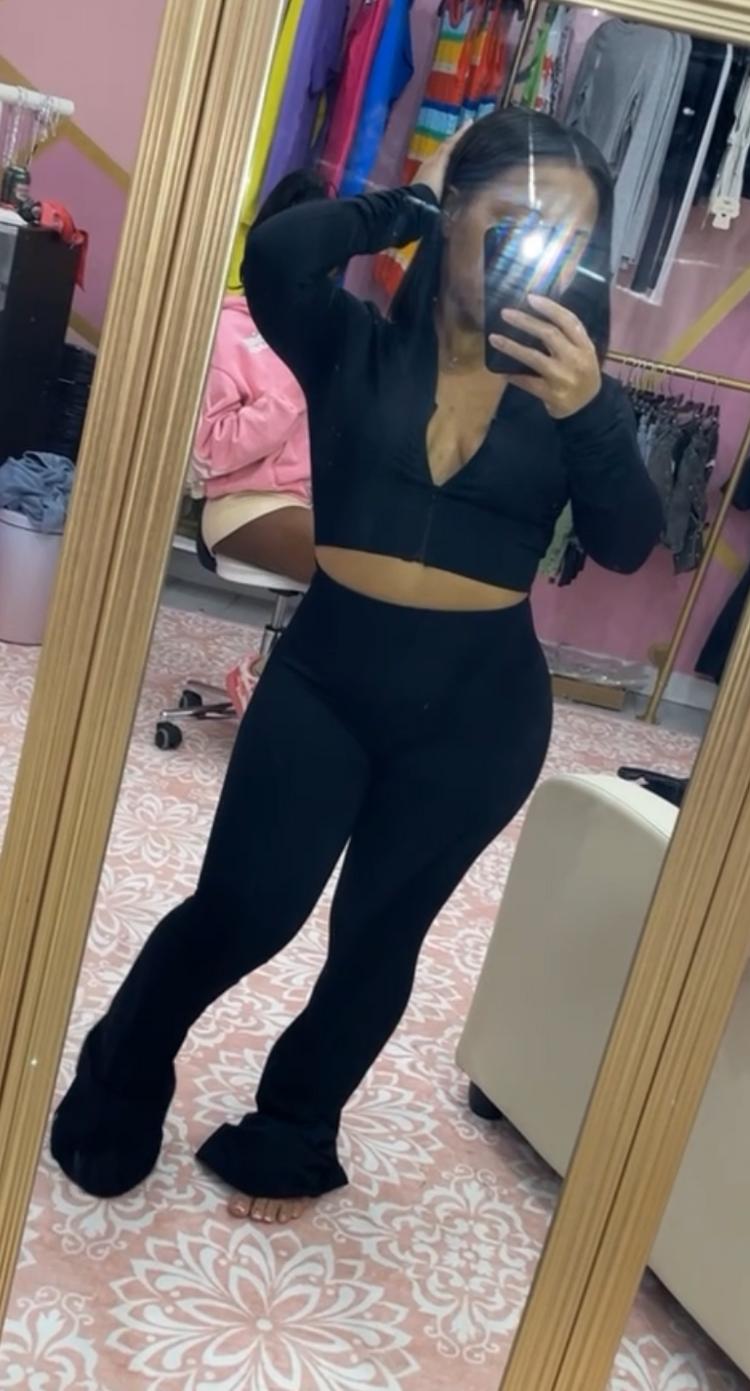 woman wearing black 2 piece activewear set