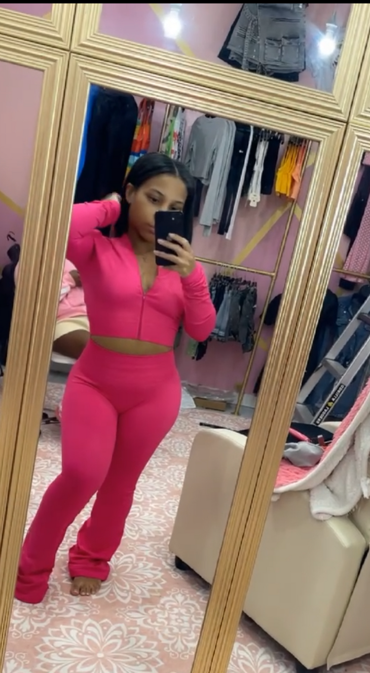 woman wearing pink 2 piece activewear set 
