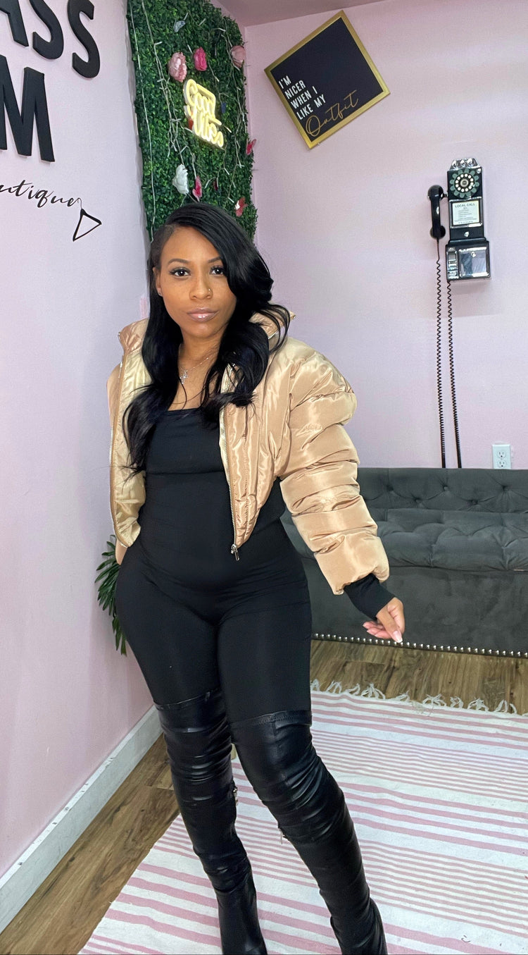 woman wearing tan crop bomber jacket