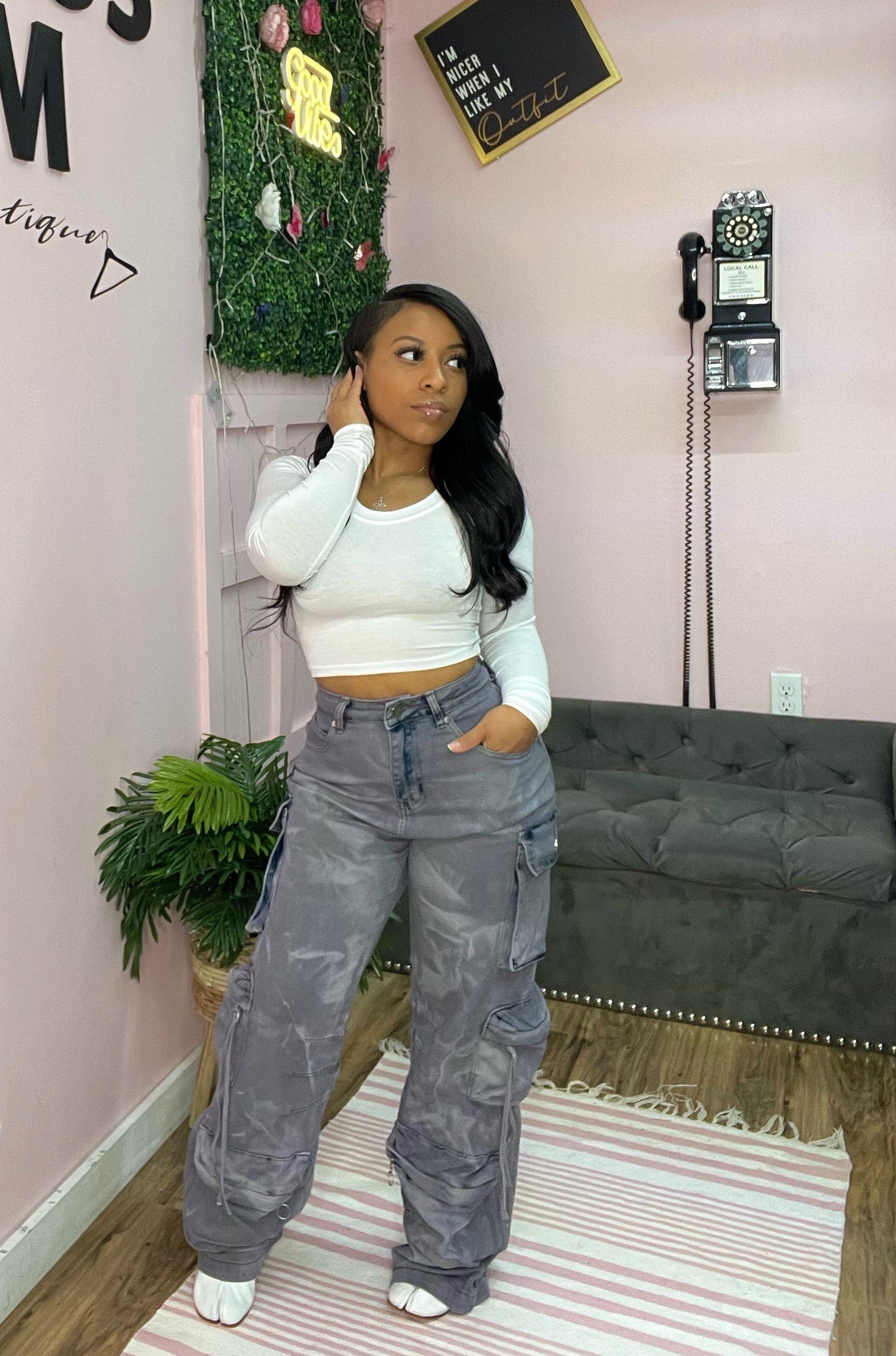 woman wearing cargo pants and white top