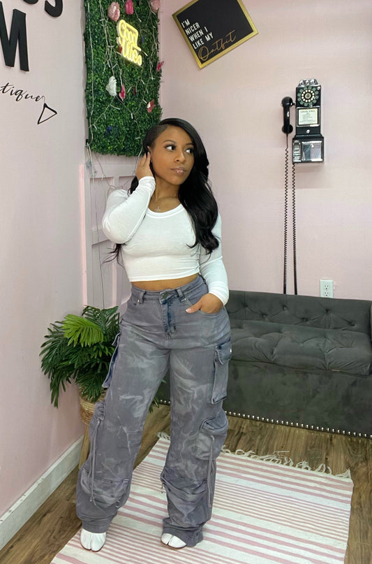 woman wearing cargo pants and white top